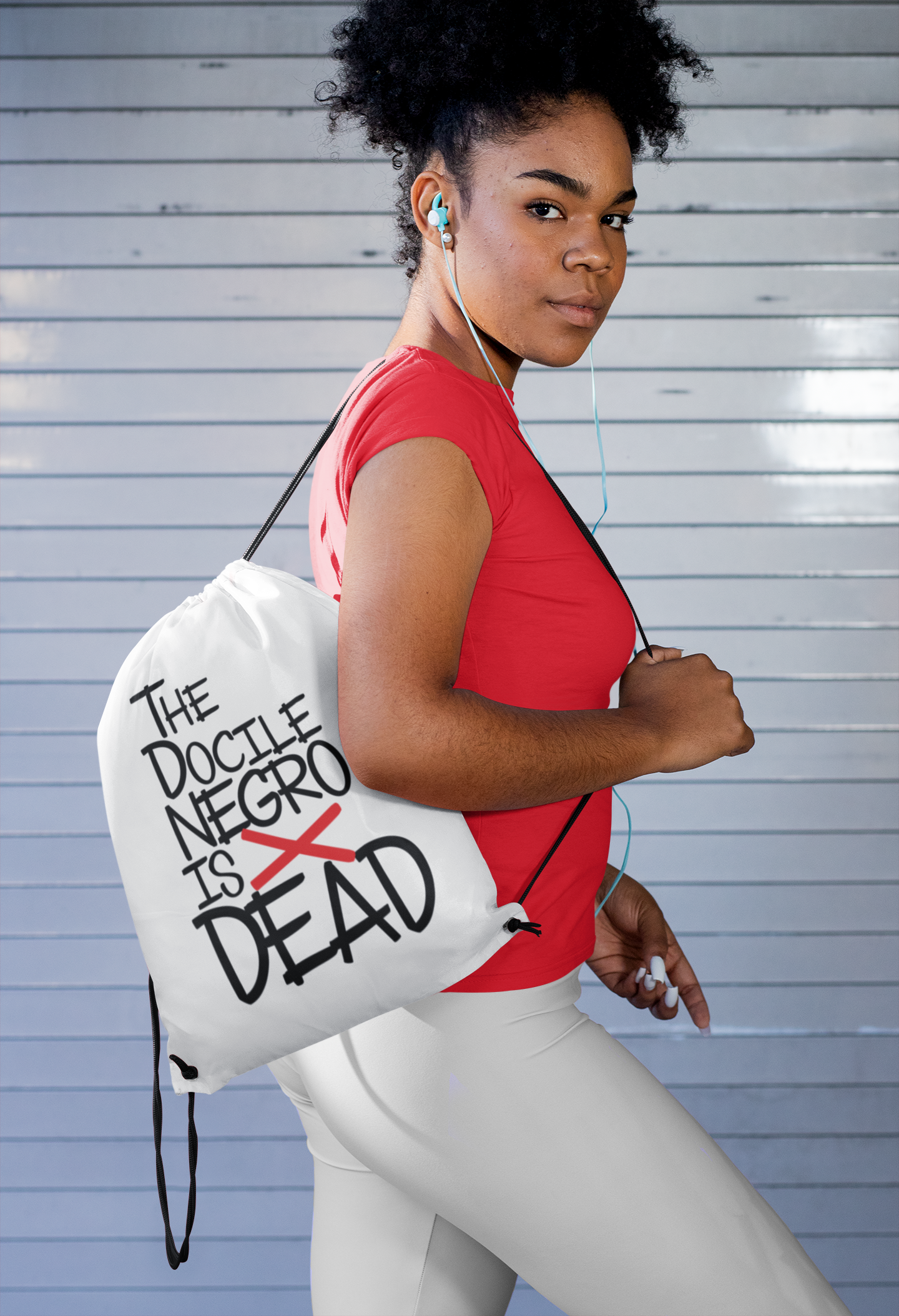 Woman wearing drawstring bag.